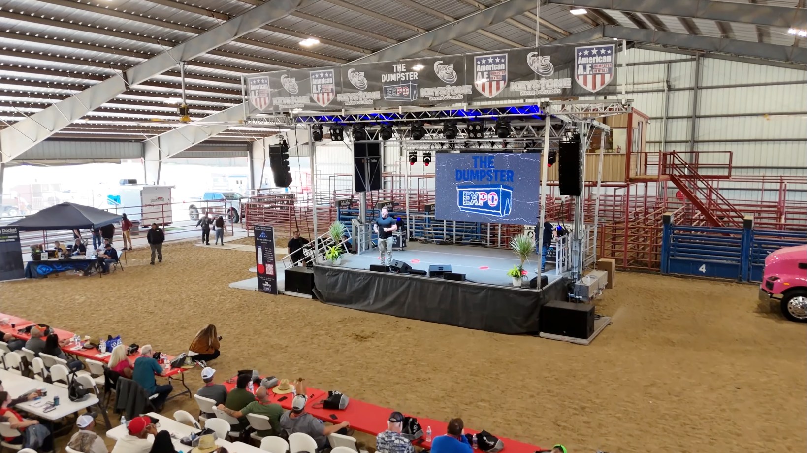 Vendors and attendees connecting on the Dumpster Expo floor